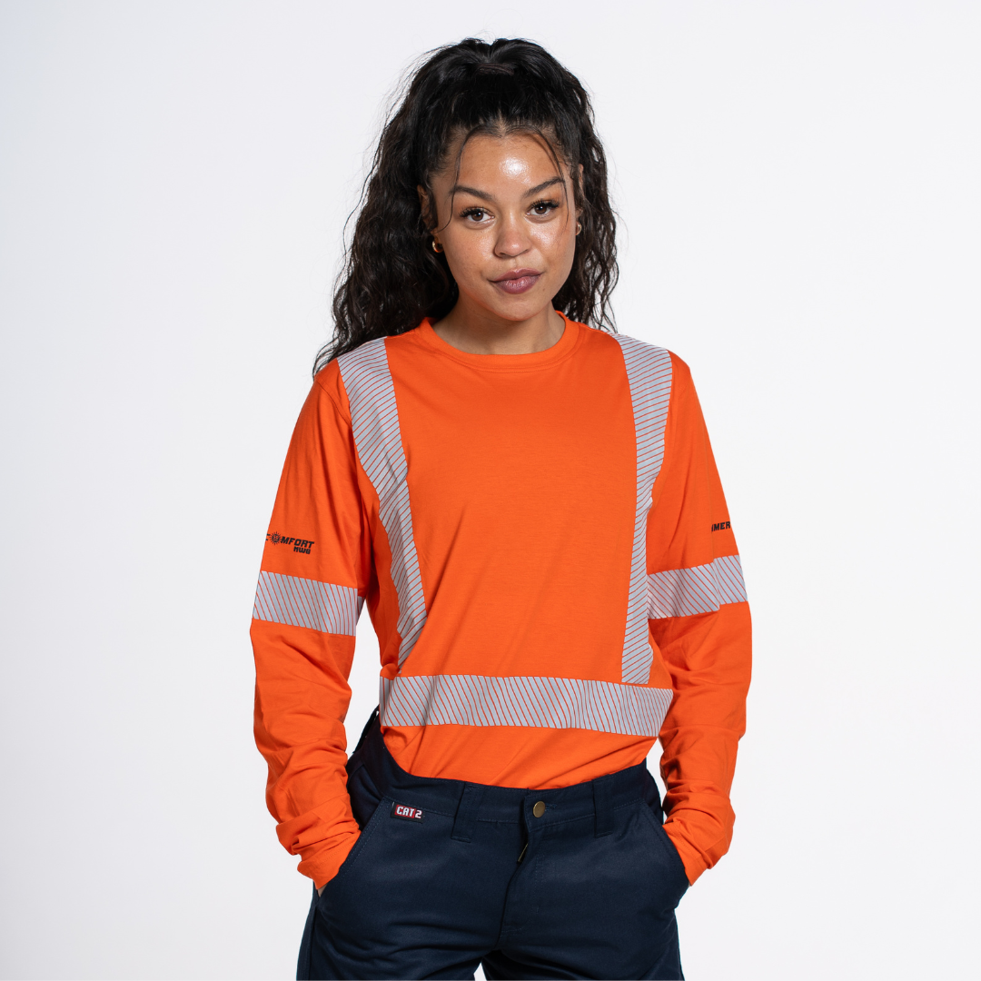 MWG SUMMER COMFORT Women's Hi Vis Long Sleeve. Women's Hi Vis Shirt is bright orange with silver reflective striping. Women's Hi Vis Shirt meets CSA Standard for high-visibility.