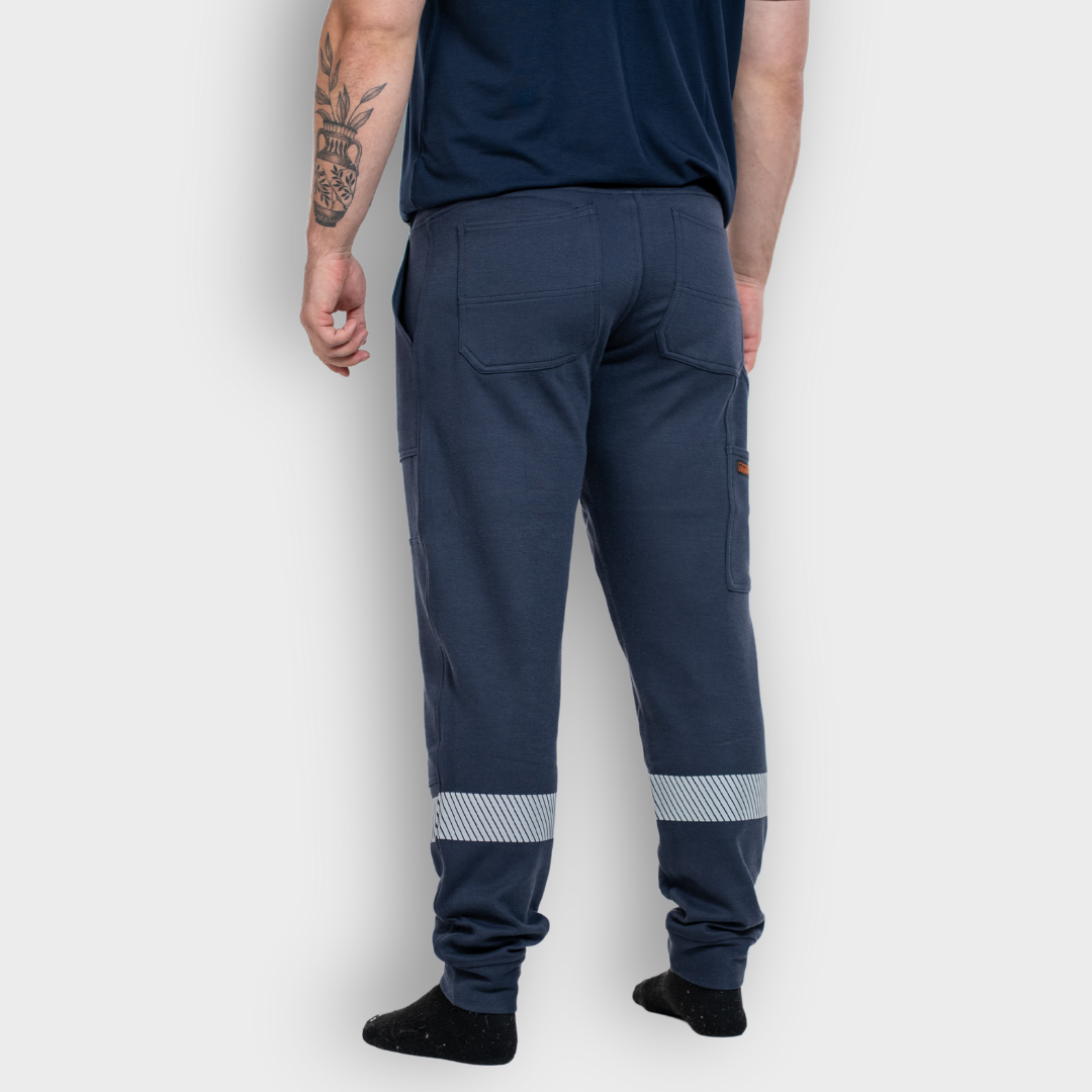 MWG PROFLEX Men's FR Utility Jogger. Men's FR Pant is navy with silver reflective striping. FR Pant is CAT 3 FR.