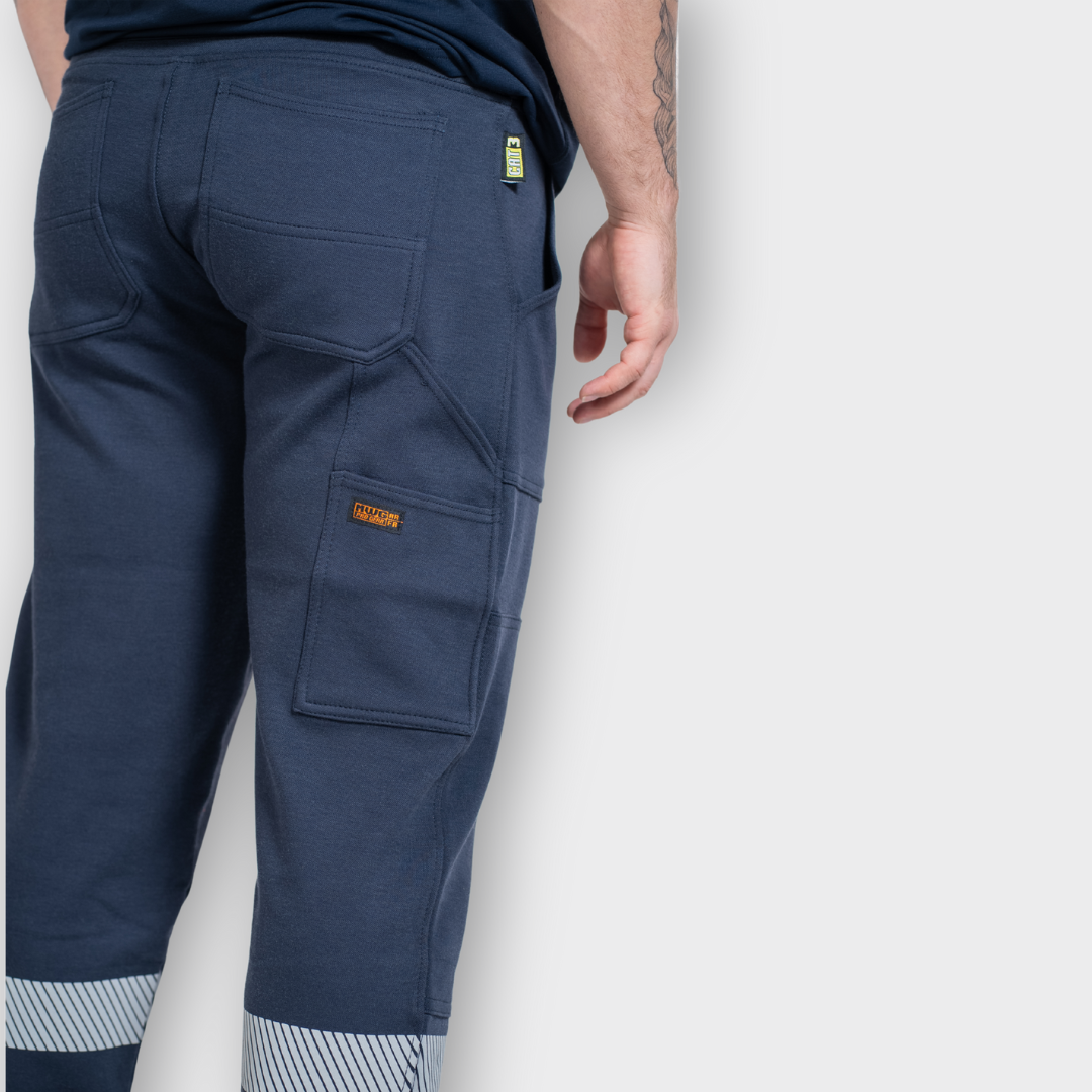 MWG PROFLEX Men's FR Utility Jogger. Men's FR Pant is navy with silver reflective striping. FR Pant is CAT 3 FR.