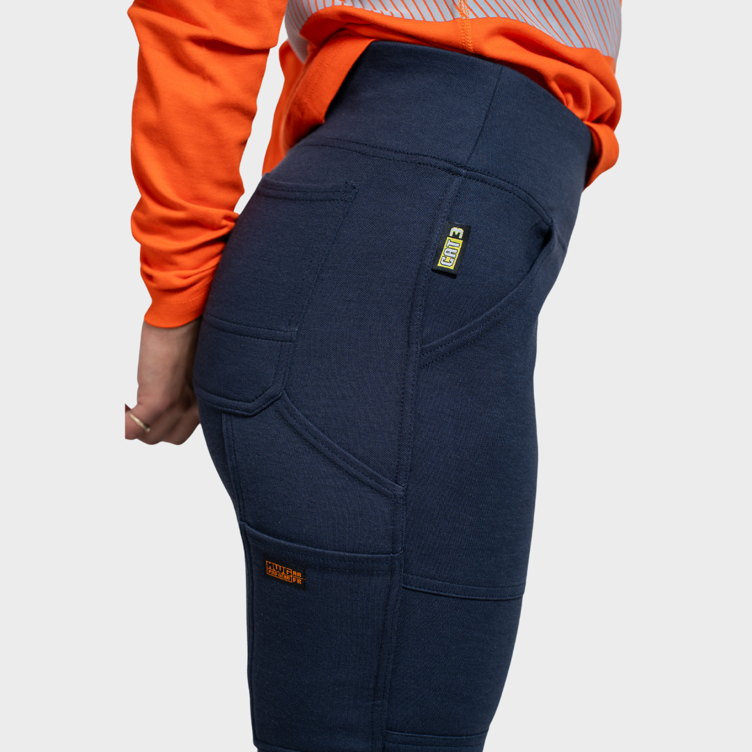 MWG PROFLEX Women's FR Utility Jogger. Women's FR Pant is navy with silver reflective striping. Women's FR Pant is CAT 3 FR.