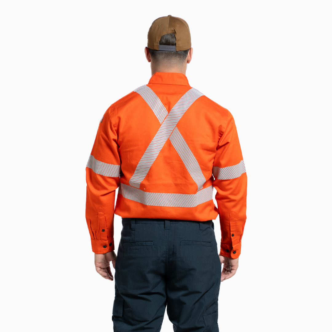 MWG COTTON COMFORT Men's FR Shirt. Men's FR Shirt is bright orange with silver segmented reflective striping on torso and sleeves for high-visibility. Men's FR Work Shirt has a dress shirt collar and black FR buttons on front. Men's FR Shirt has two large chest pockets with flaps. Men's FR Shirt is made with MWG COTTON COMFORT, a cotton-rich flame-resistant fabric. Men's FR Shirt has a CAT 2 FR rating.