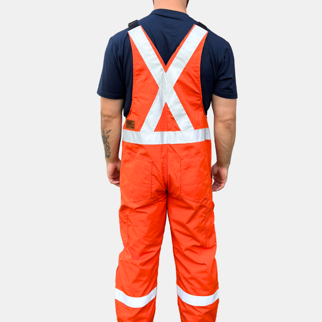 MWG lightweight bib overall. FR Bib Overall is bright orange in colour with silver reflective tape on torso and legs.