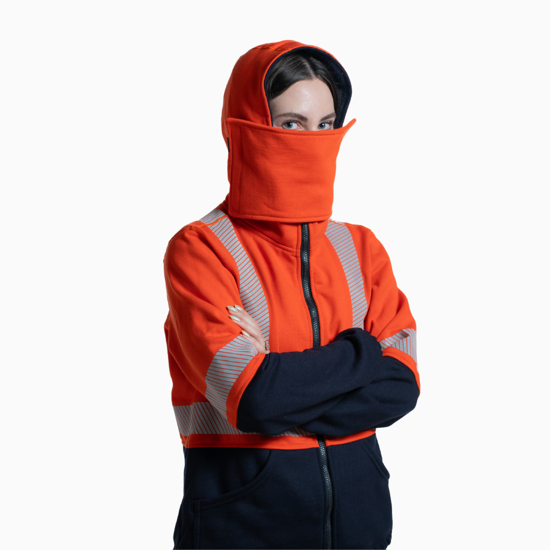 MWG BLOCKER Women's FR Full-Zip Hoodie. Women's FR Hoodie is orange and navy with silver reflective striping. CAT 3 FR.