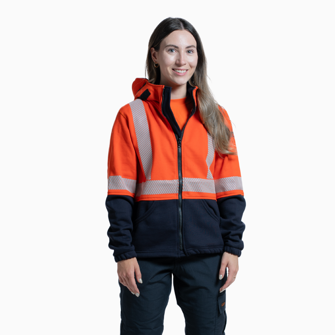 MWG BLOCKER Women's FR Full-Zip Hoodie. Women's FR Hoodie is orange and navy with silver reflective striping. CAT 3 FR.