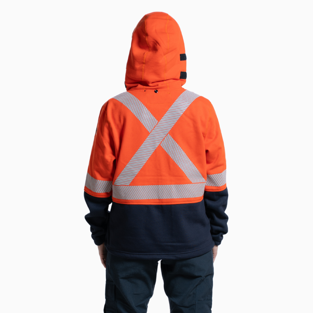 MWG BLOCKER Women's FR Full-Zip Hoodie. Women's FR Hoodie is orange and navy with silver reflective striping. CAT 3 FR.