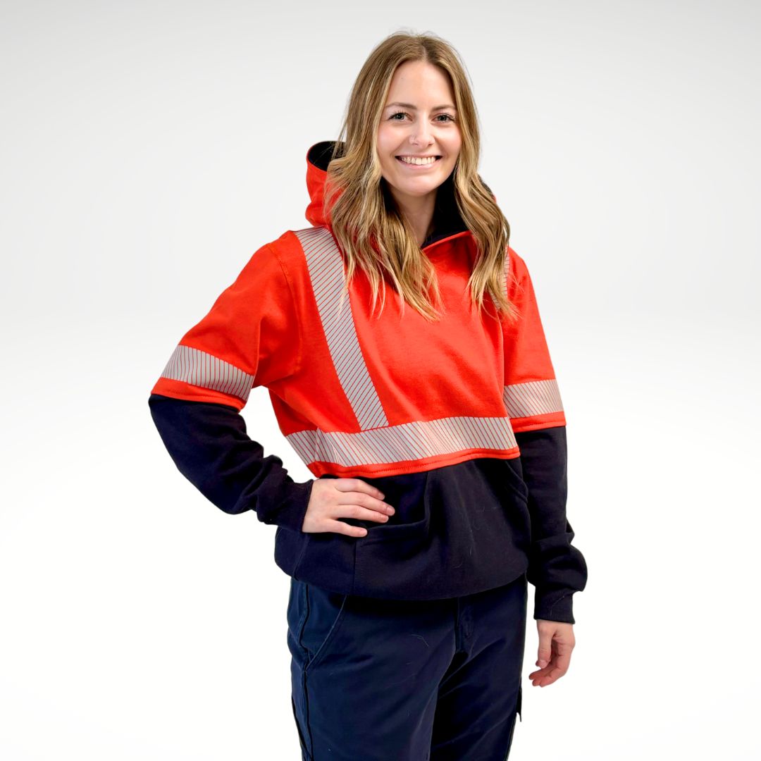 MWG BLOCKER Women's FR Pullover Hoodie. FR Hoodie is bright orange and navy with silver reflective striping on torso and sleeves.