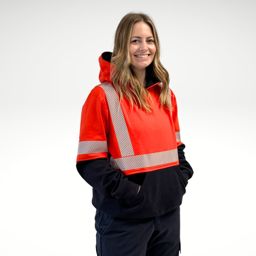 MWG BLOCKER Women's FR Pullover Hoodie. FR Hoodie is bright orange and navy with silver reflective striping on torso and sleeves.