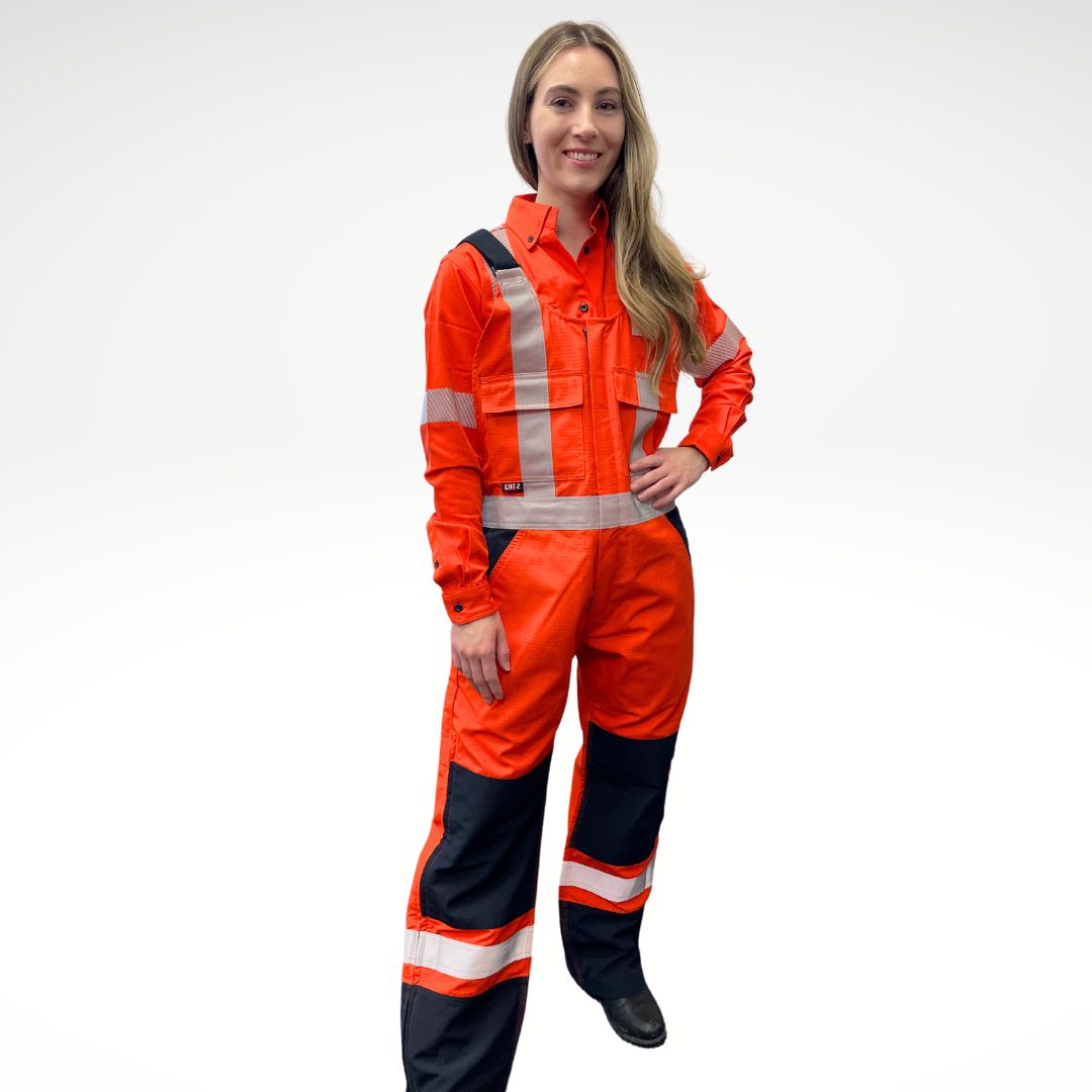 MWG RIPGUARD Women's FR Overall. Women's FR Overall is bright orange and navy with silver reflective striping on torso and legs for high-visibility. Women's FR Overalls have black shoulder straps and a black FR Zipper. Women's FR Overall is made with MWG RIPGUARD, an inherently fire-resistant ripstop fabric. Women's FR Overalls are CAT 2 FR.