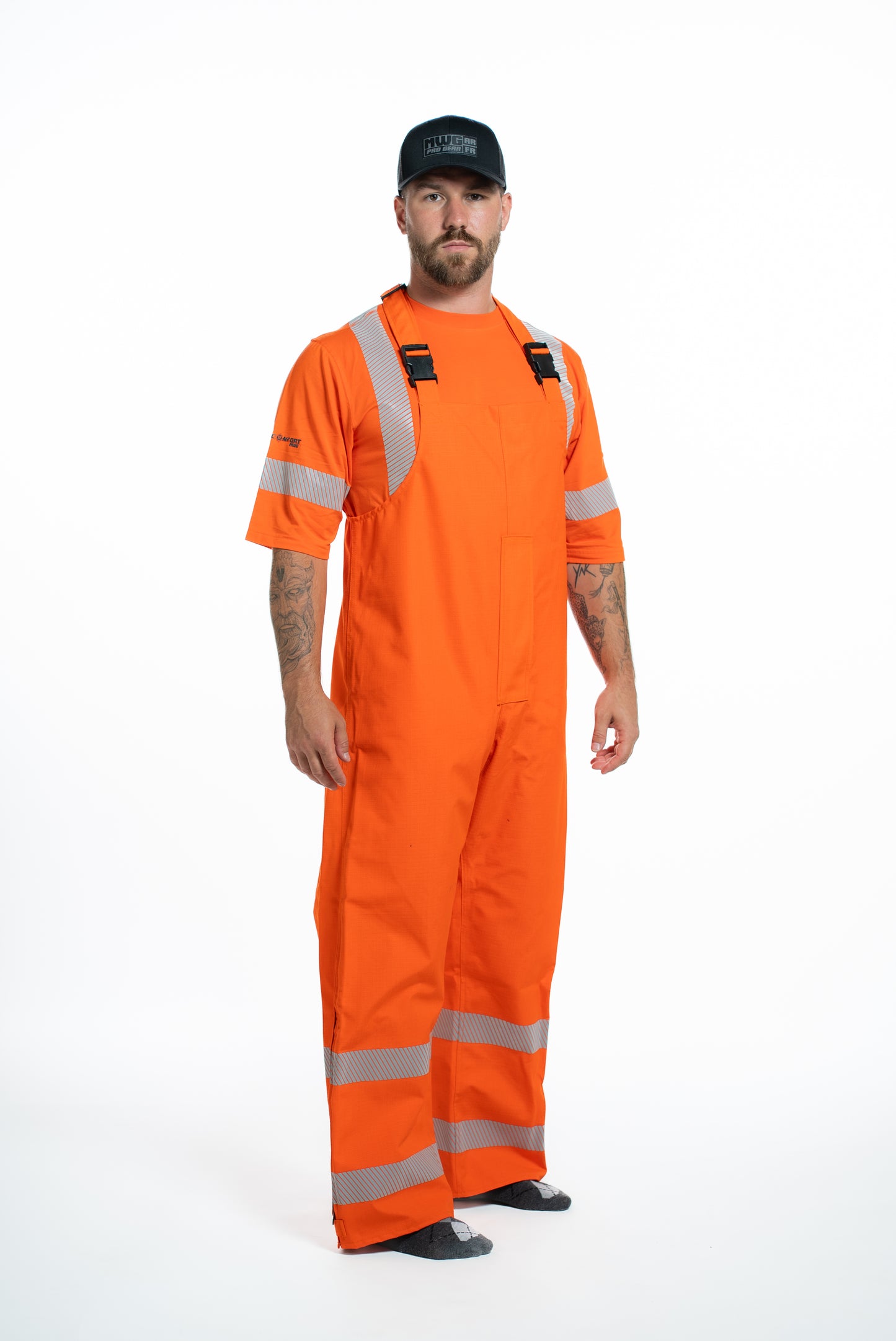 MWG STORMSHIELD Men's FR Rain Pants. FR Rain Pants are bright orange with silver reflective striping to meet hi-vis standards.