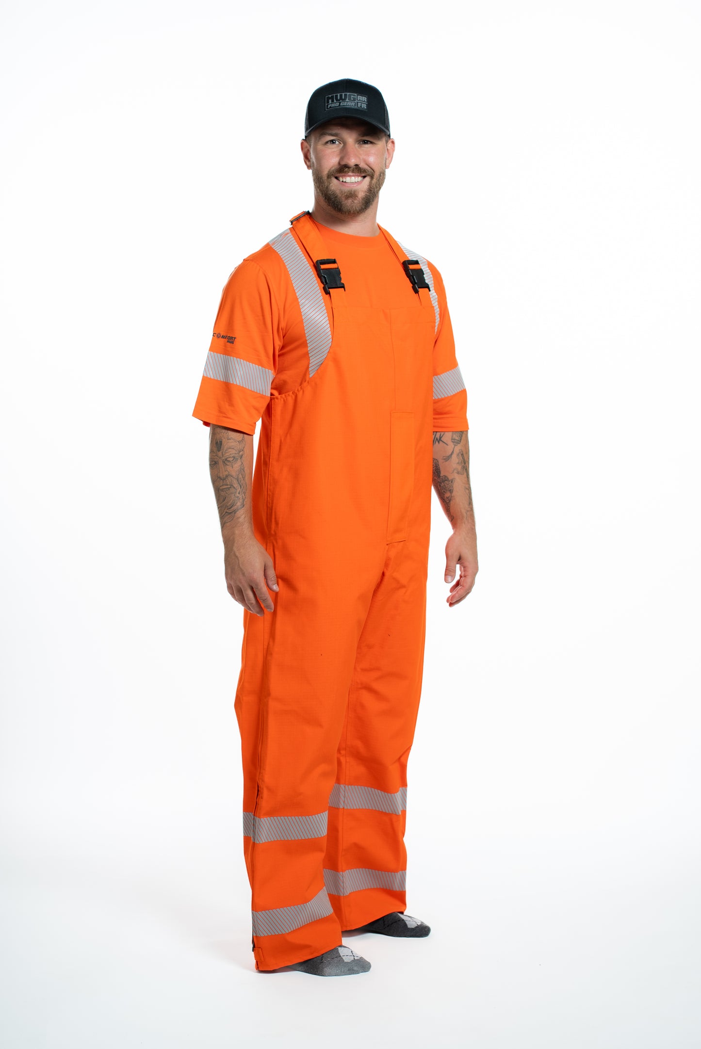 MWG STORMSHIELD Men's FR Rain Pants. FR Rain Pants are bright orange with silver reflective striping to meet hi-vis standards.