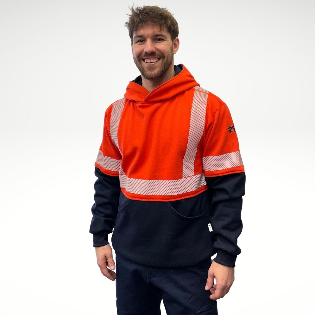 MWG BLOCKER FR Men's Hoodie. Men's fire-resistant hoodie is bright orange and navy with hi-vis striping. Fire-resistant hoodie is inherently flame-resistant, made from a heavyweight FR fleece. FR Hoodie is CAT 3 FR.