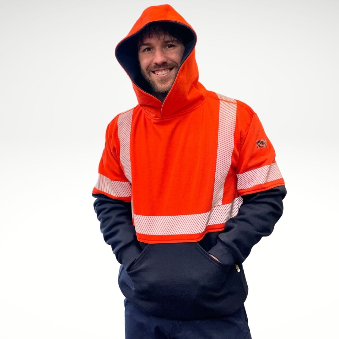 MWG BLOCKER FR Men's Hoodie. Men's fire-resistant hoodie is bright orange and navy with hi-vis striping. Fire-resistant hoodie is inherently flame-resistant, made from a heavyweight FR fleece. FR Hoodie is CAT 3 FR.