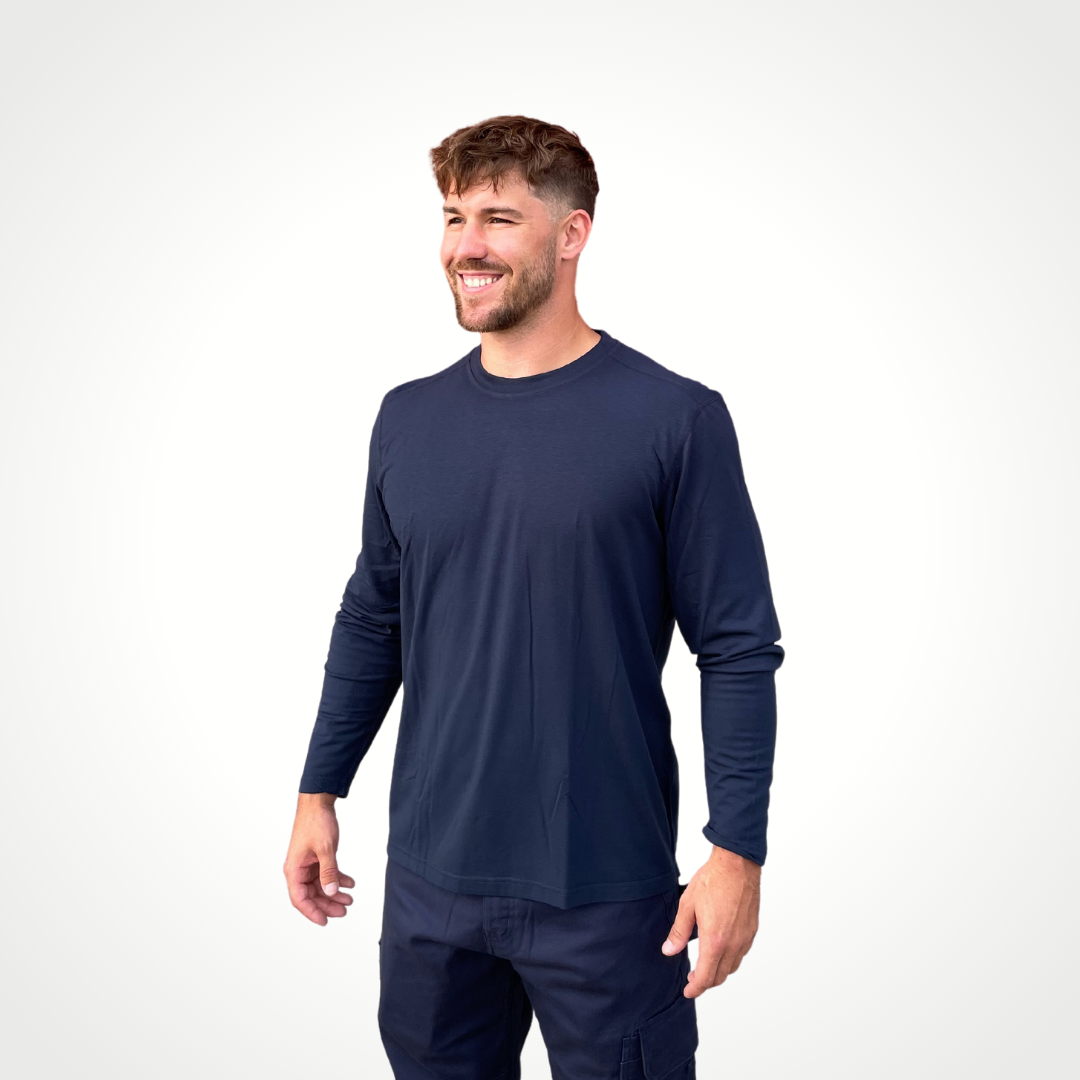 MWG FLEXSAFE Men's FR Long-Sleeve T-Shirt. Men's FR Base Layer Shirt is navy. Men's FR Base Layer Long-Sleeve is made with MWG FLEXSAFE, an inherent flame-resistant fabric. MWG FLEXSAFE is a moisture-wicking, 4-way stretch fabric. FR Base Layer shirt has CAT 1 FR rating.