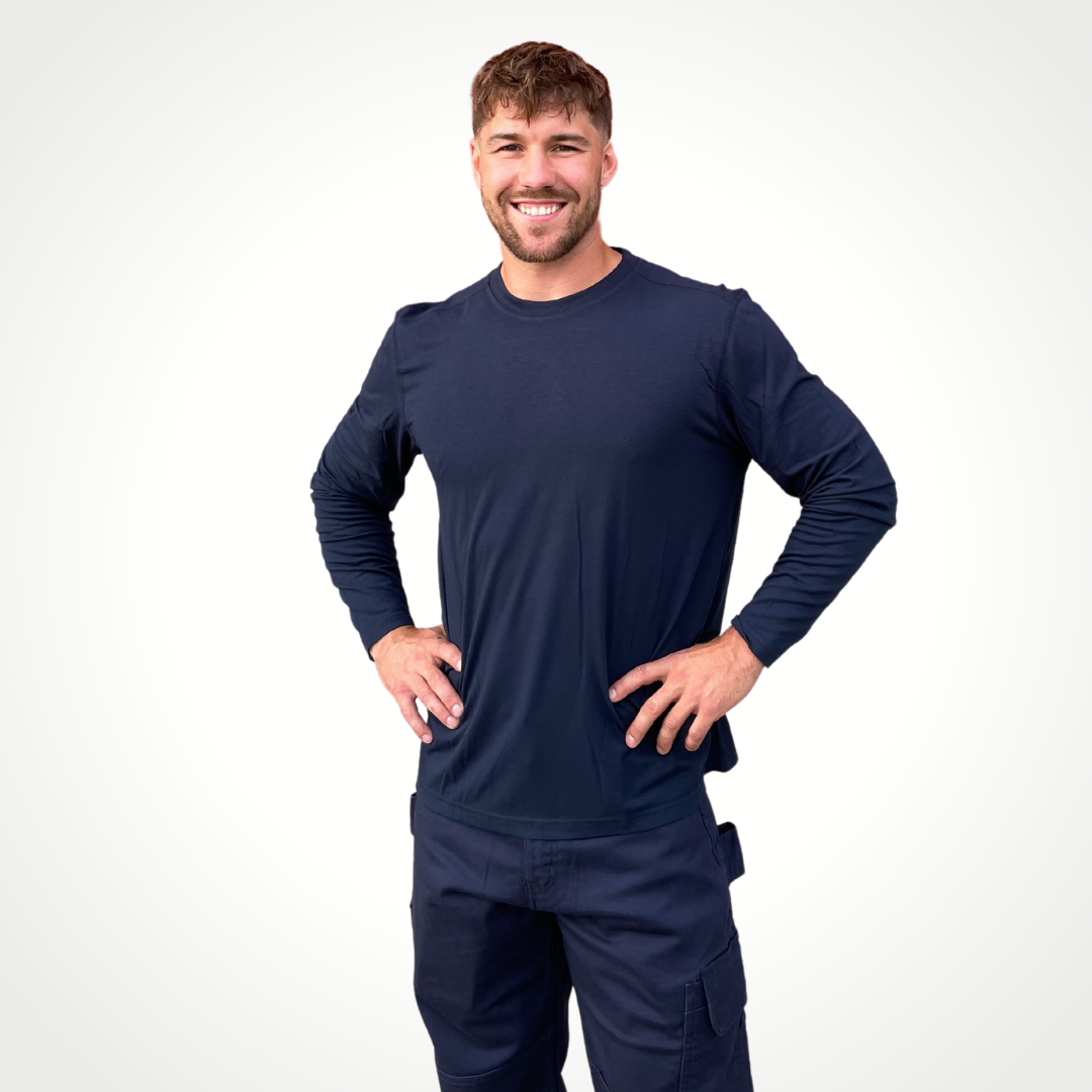 MWG FLEXSAFE Men's FR Long-Sleeve T-Shirt. Men's FR Base Layer Shirt is navy. Men's FR Base Layer Long-Sleeve is made with MWG FLEXSAFE, an inherent flame-resistant fabric. MWG FLEXSAFE is a moisture-wicking, 4-way stretch fabric. FR Base Layer shirt has CAT 1 FR rating.