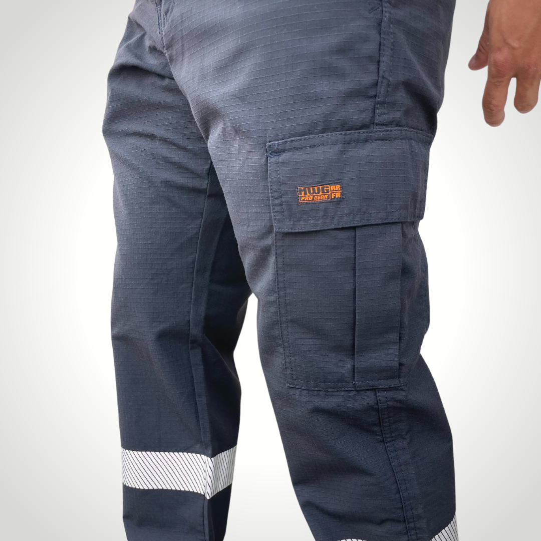 MWG RIPGUARD Men's FR Utility Pant. Men's FR Pants are navy with silver segmented reflective striping on lower leg for hi-vis. FR Pants have a cargo pocket on left leg and tool pocket on left leg. FR Pants are made with MWG RIPGUARD, a flame-resistant ripstop fabric. FR Pants are highly durable. Men's FR Pants have a CAT 2 FR rating.