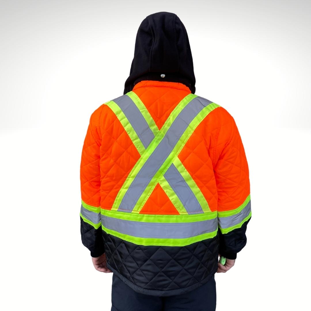 Men's Hi-Vis Freezer Jacket. Hi-Vis Freezer Jacket is bright orange and black with reflective striping in an X pattern on back for hi-vis compliance. Hi-Vis Freezer Jacket is made with a diamond quilt and has a black detachable hood.