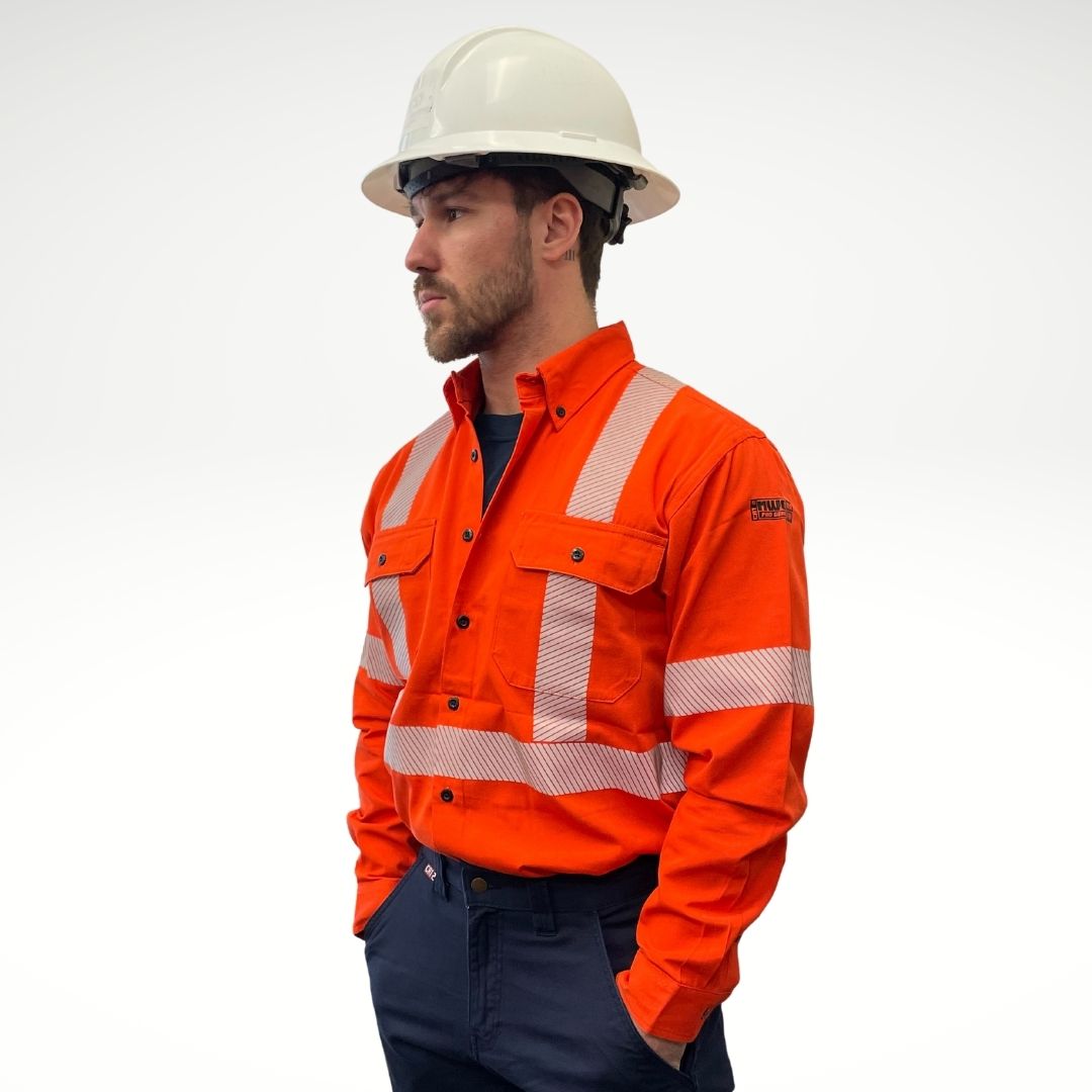 MWG COMFORT WEAVE Men's FR Shirt. Men's fire-resistant shirt is bright orange with black buttons and hi-vis reflective striping. Men's FR Shirt has two chest pockets and a dress shirt collar. Fire-resistant shirt is made with inherently fire-resistant fabric. FR Shirt is CAT 2 FR.