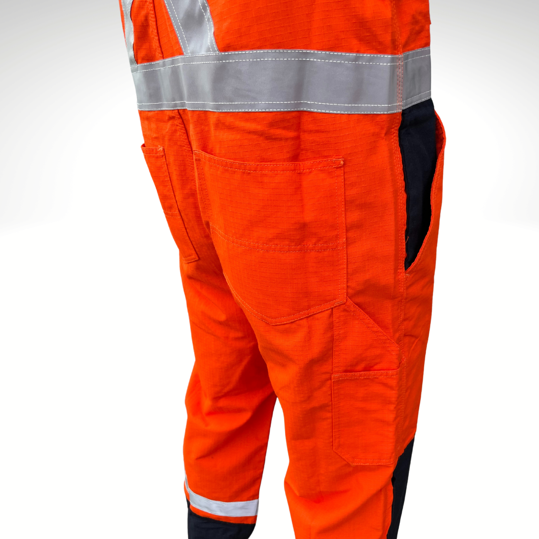 MWG RIPGUARD Men's FR Bib Overall. Men's FR Overall is bright orange and navy with silver reflective striping on torso and legs for high-visibility. FR Overalls have two chest pockets with flaps, two FR leg zippers, and a front FR zipper. FR Overalls have black FR adjustable shoulder straps. FR Overalls are made with MWG RIPGUARD, a flame-resistant ripstop fabric. FR Overalls have a CAT 2 FR rating.