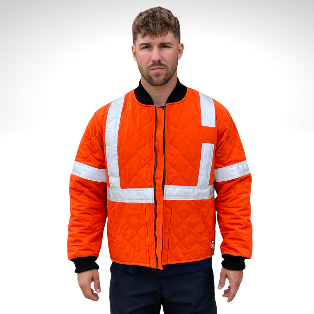 MWG RIPGUARD Men's FR Freezer Jacket. FR Freezer Jacket is bright orange. FR Freezer Jacket has silver reflective striping on torso and sleeves for high-visibility. FR Freezer Jacket has a black FR zipper and black FR cuffs. FR Freezer Jacket is quilted with a 3" diamond quilt. FR Freezer Jacket is made with MWG RIPGUARD, an inherently flame-resistant ripstop fabric. FR Freezer Jacket has a CAT 4 FR rating.