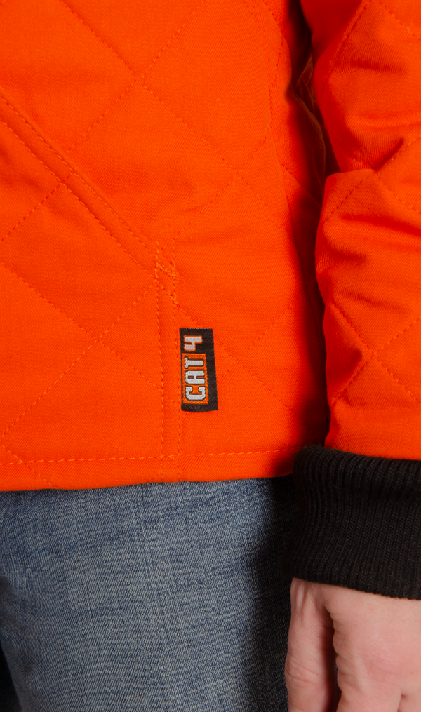 Close up image of CAT 4 label on women's FR freezer jacket identifying flame-resistance.