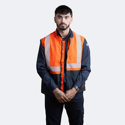 MWG STORMSHIELD Men's FR Vest. Men's FR Vest is orange and navy with silver reflective striping. Men's FR Vest is CAT 2 FR.