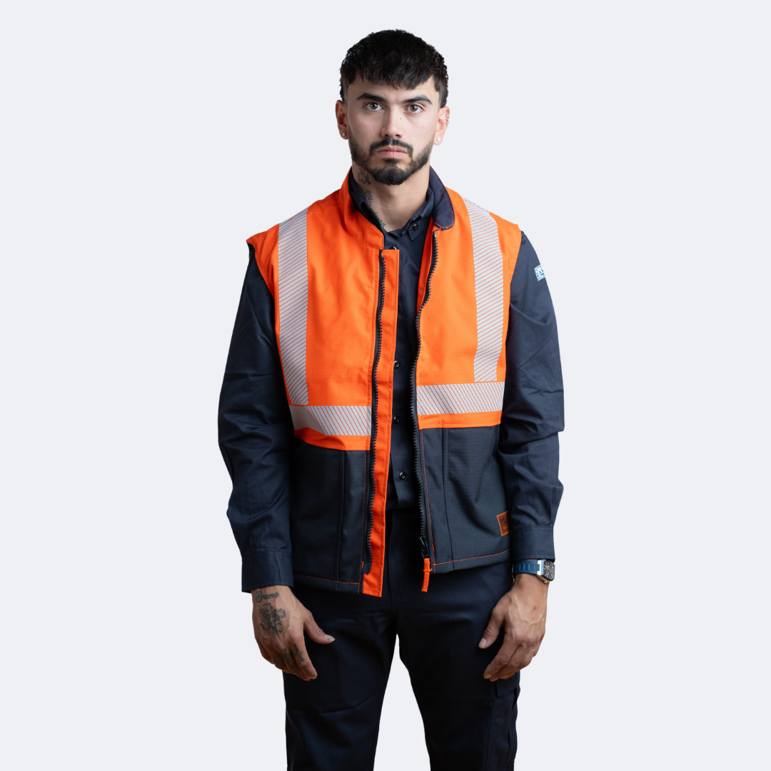 MWG STORMSHIELD Men's FR Vest. Men's FR Vest is orange and navy with silver reflective striping. Men's FR Vest is CAT 2 FR.