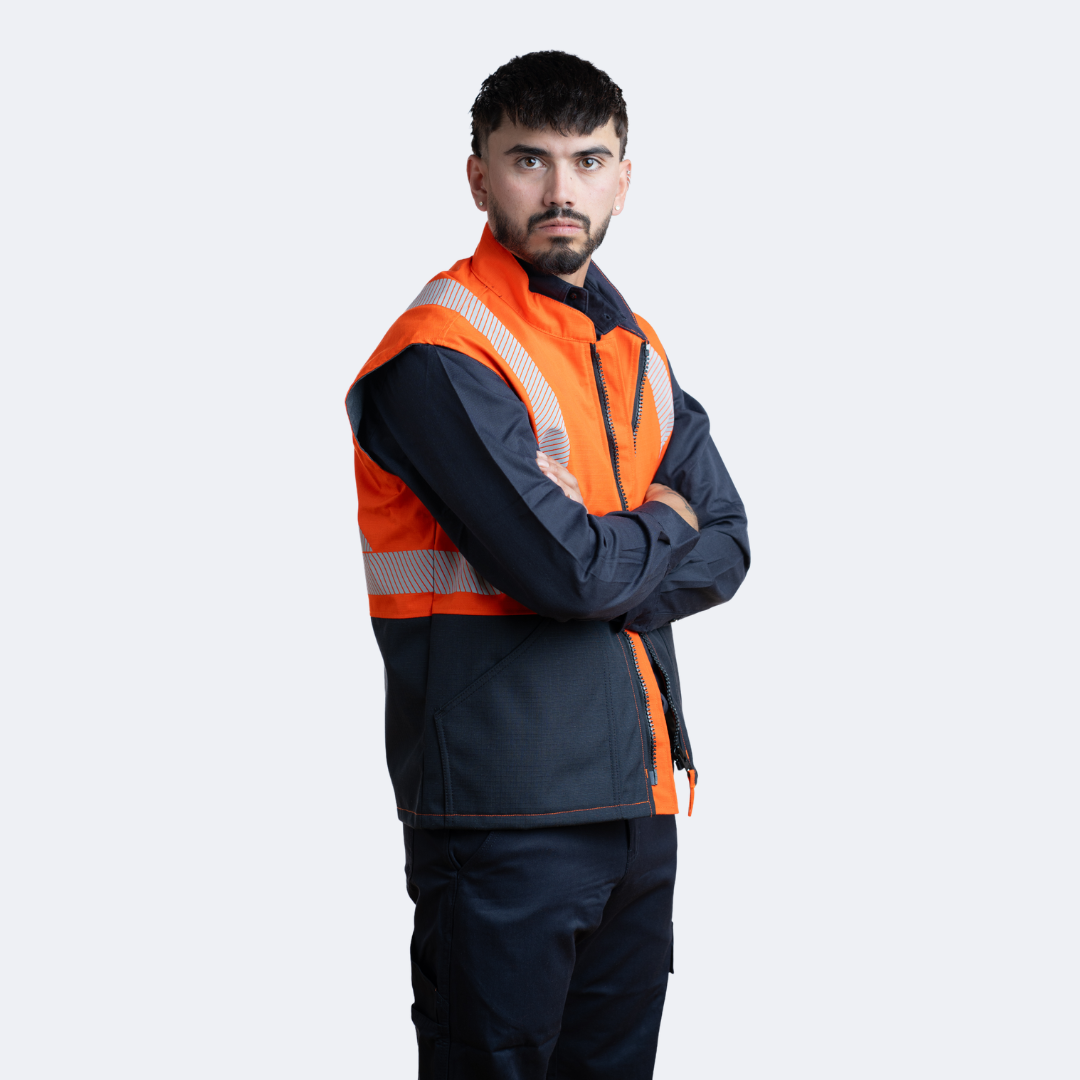 MWG STORMSHIELD Men's FR Vest. Men's FR Vest is orange and navy with silver reflective striping. Men's FR Vest is CAT 2 FR.