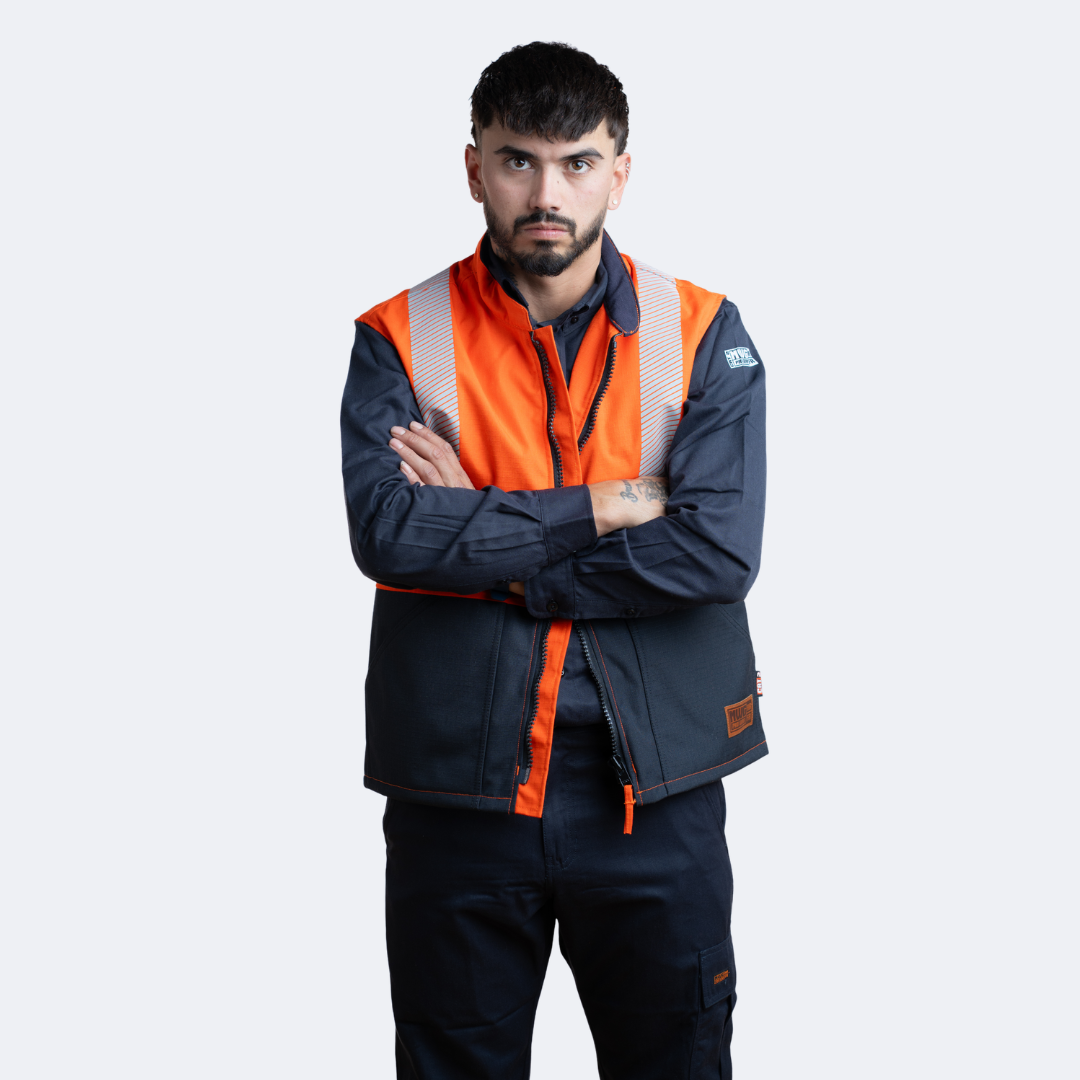 MWG STORMSHIELD Men's FR Vest. Men's FR Vest is orange and navy with silver reflective striping. Men's FR Vest is CAT 2 FR.