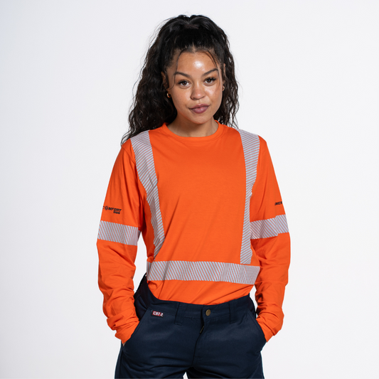 MWG SUMMER COMFORT Women's Hi Vis Long Sleeve. Women's Hi Vis Shirt is bright orange with silver reflective striping. Women's Hi Vis Shirt meets CSA Standard for high-visibility.