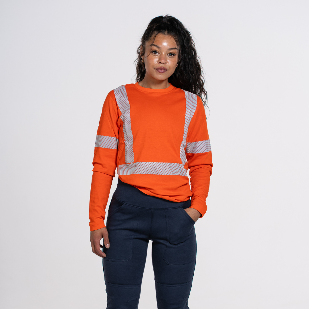 MWG EVOLUTION Women's FR Long Sleeve Shirt. Women's FR Shirt is bright orange with silver reflective striping. Women's FR Shirt is CAT 2 FR.