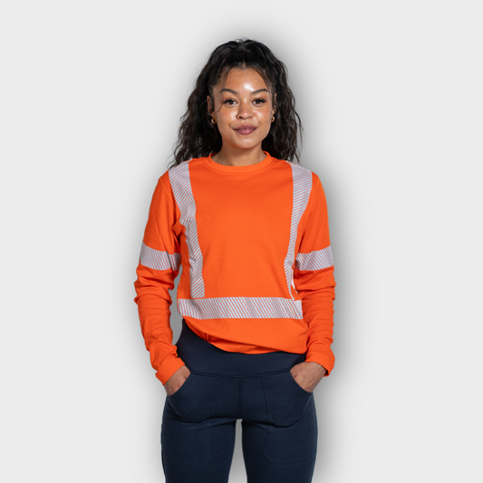 MWG EVOLUTION Women's FR Long Sleeve Shirt. Women's FR Shirt is bright orange with silver reflective striping. Women's FR Shirt is CAT 2 FR.