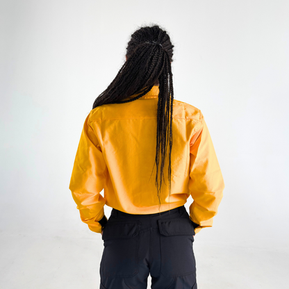 MWG RIPGUARD Women's FR Wildland Shirt. Women's FR Shirt is bright yellow with a black velcro patch.