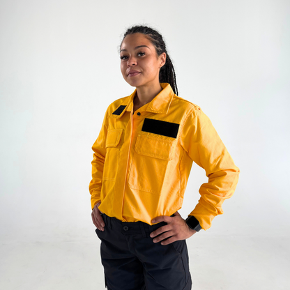MWG RIPGUARD Women's FR Wildland Shirt. Women's FR Shirt is bright yellow with a black velcro patch.