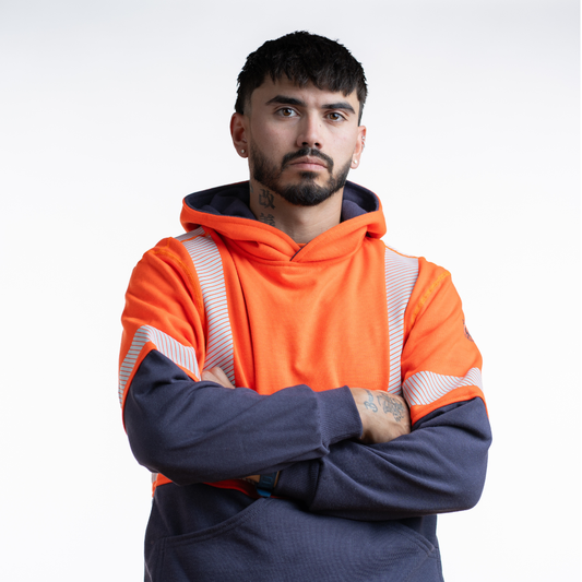 MWG BLOCKER Men's FR Pullover Hoodie. Men's FR Hoodie is orange and navy with silver reflective. FR Hoodie is CAT 3 FR.