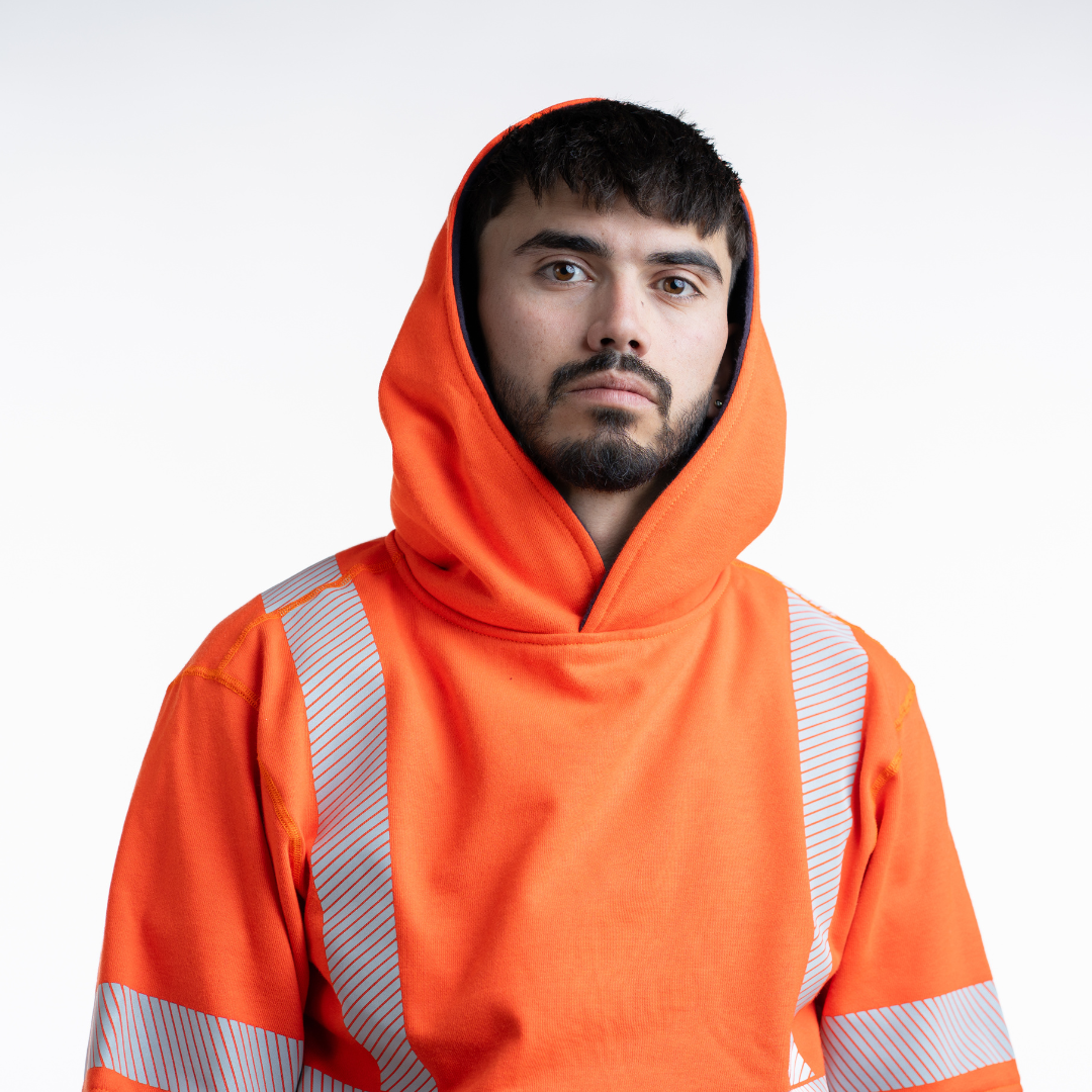 MWG BLOCKER Men's FR Pullover Hoodie. Men's FR Hoodie is orange and navy with silver reflective. FR Hoodie is CAT 3 FR.