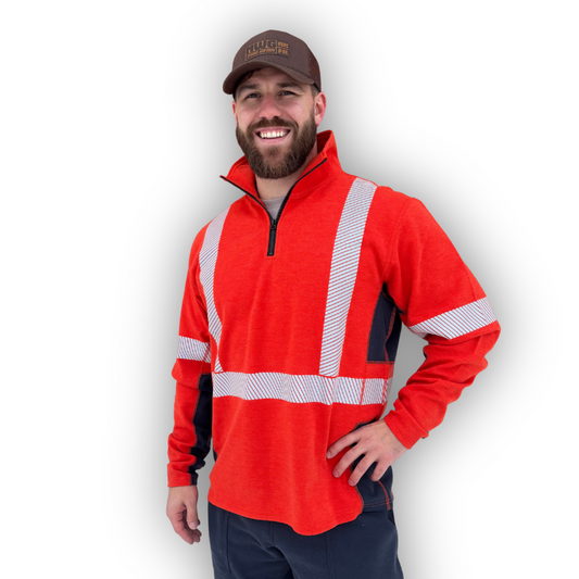 MWG PROFLEX Men's FR Quarter Zip. FR Quarter Zip is bright orange and made with inherently flame-resistant fabric.