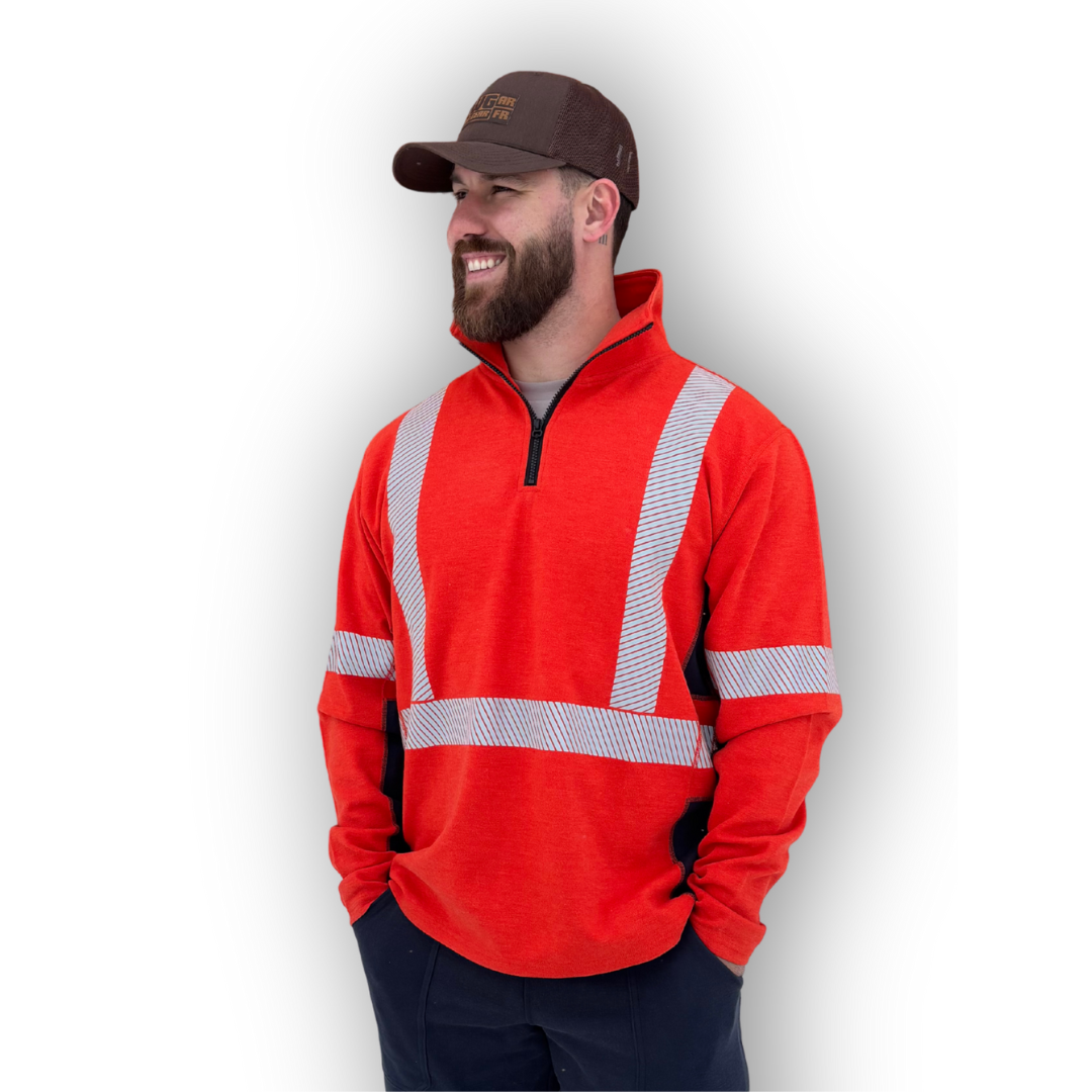 MWG PROFLEX Men's FR Quarter Zip. FR Quarter Zip is bright orange and made with inherently flame-resistant fabric.