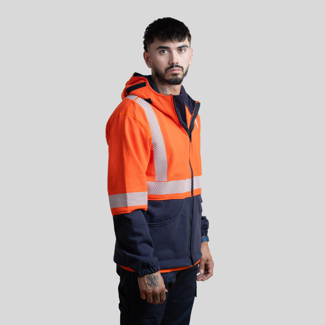 MWG BLOCKER Men's FR Hoodie. Men's FR Hoodie is orange and navy with silver reflective. Men's FR Hoodie is CAT 3 FR.