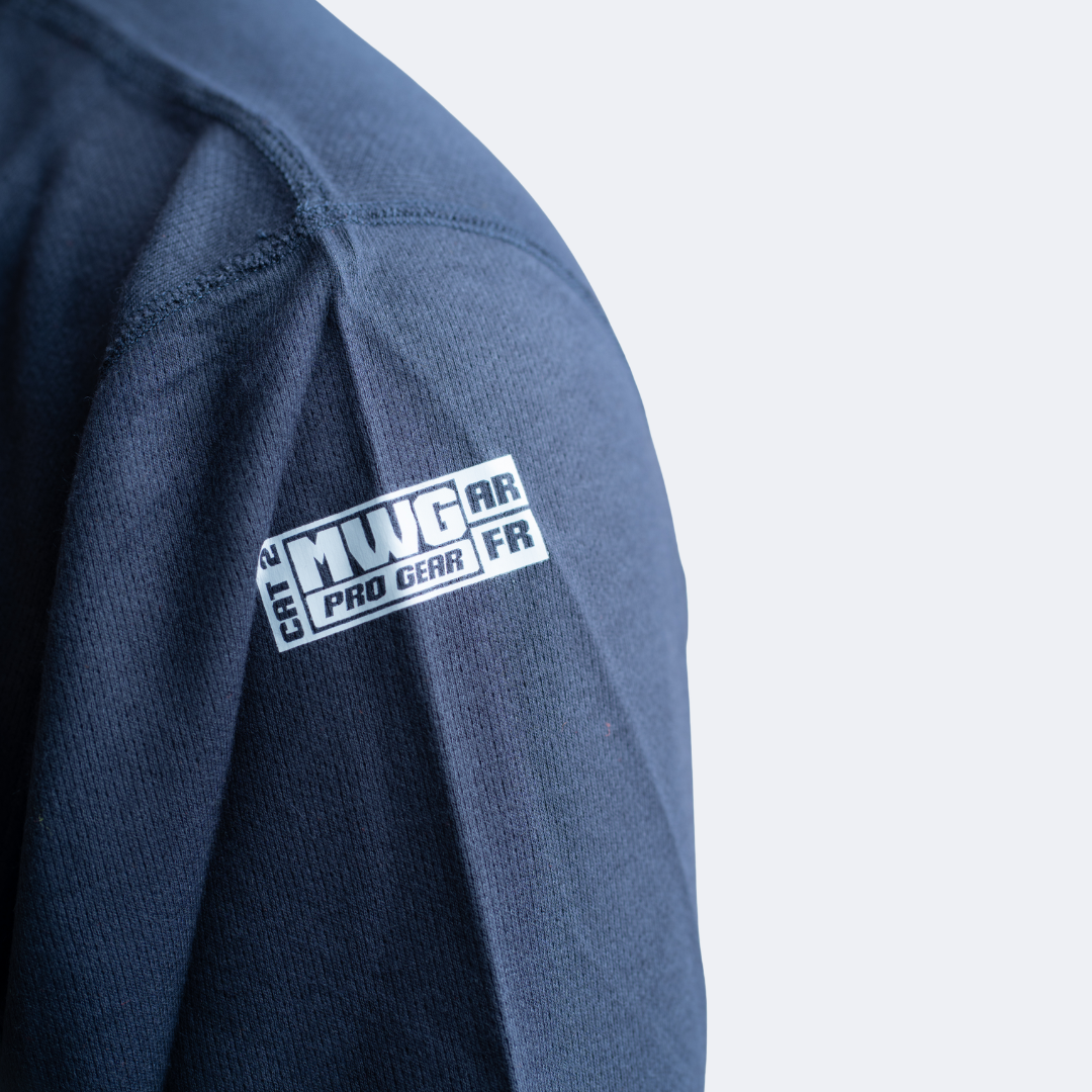 MWG TRANSMISSION Men's FR Base Layer Long-Sleeve. Men's FR Shirt is navy. Men's FR Shirt is CAT 2 FR.