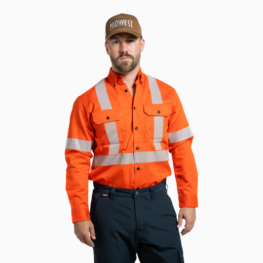 MWG COTTON COMFORT Men's FR Shirt. Men's FR Shirt is bright orange with silver segmented reflective striping on torso and sleeves for high-visibility. Men's FR Work Shirt has a dress shirt collar and black FR buttons on front. Men's FR Shirt has two large chest pockets with flaps. Men's FR Shirt is made with MWG COTTON COMFORT, a cotton-rich flame-resistant fabric. Men's FR Shirt has a CAT 2 FR rating.