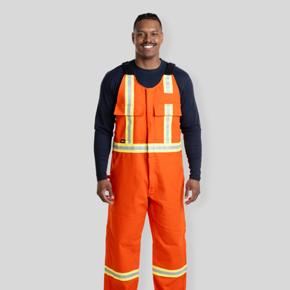 Man wearing orange FR Overalls. FR Overalls made for Welding. Heavyweight FR Canvas.