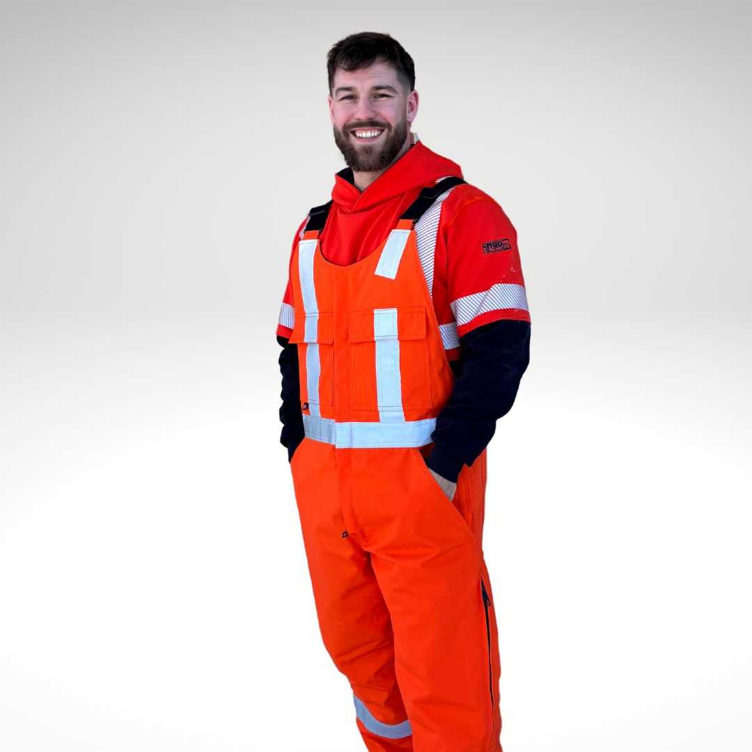 MWG STORMSHIELD Men's FR Insulated Overall. FR Overalls are bright orange with silver reflective for high-visibility. FR Overalls have two large chest pockets and black adjustable shoulder straps. FR Overalls are insulated and made with a windproof fabric for warmth. MWG STORMSHIELD is an inherently flame-resistant ripstop fabric.