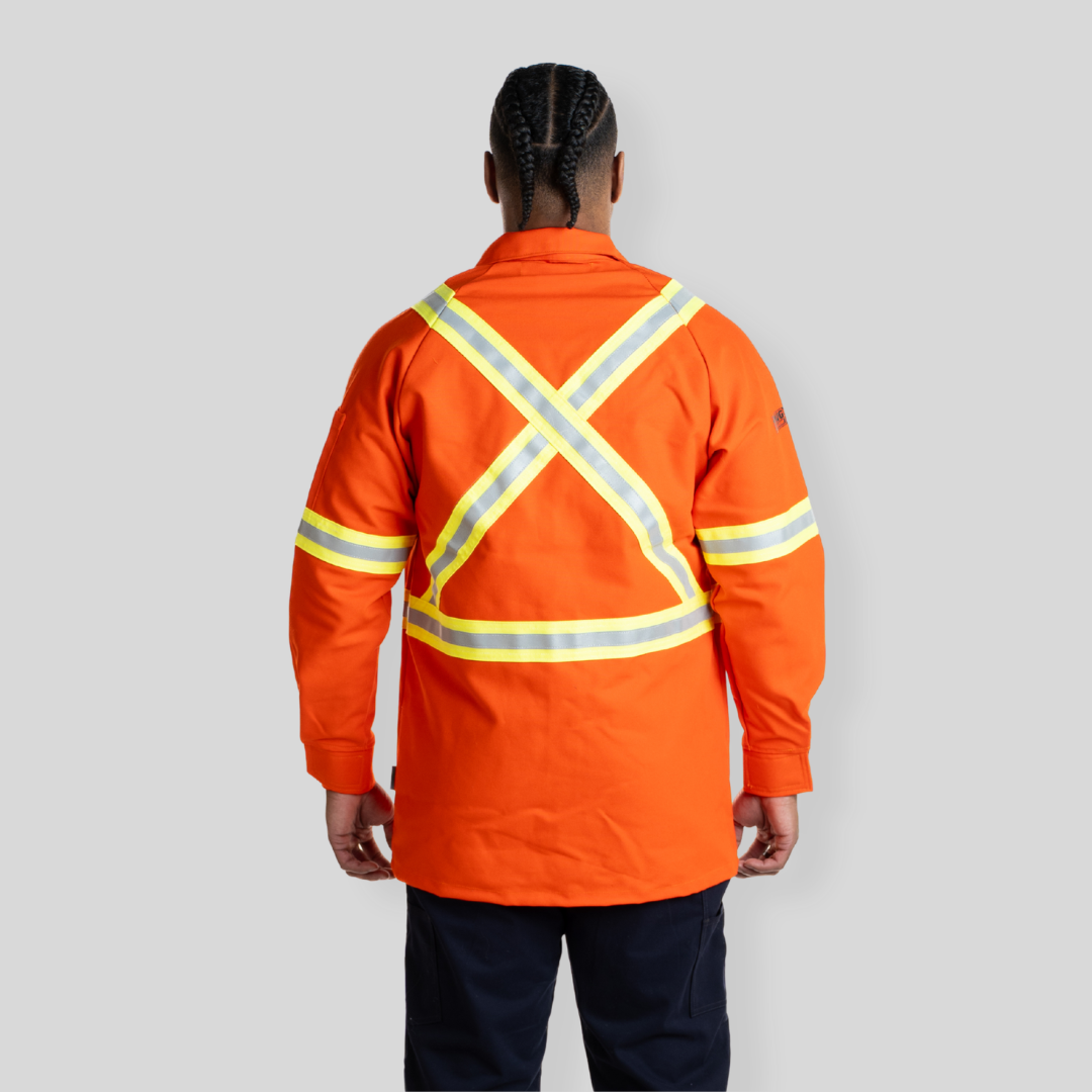 Man wearing FR Welding Jacket. FR Welding Jacket is bright orange with reflective striping for high-visibility.