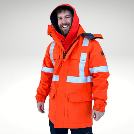 Image of MWG STORMSHIELD FR/AR Parka Jacket. FR Parka is bright orange with silver reflective striping on torso and sleeves for high-visibility. MWG STORMSHIELD is an inherent ripstop fabric for safety and durability. MWG STORMSHIELD is waterproof and windproof for warmth and comfort in cold and wet weather. Men's FR Freezer Jacket zips in for added warmth.