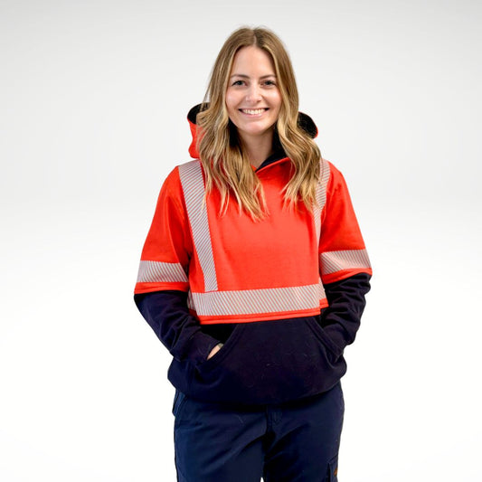 MWG BLOCKER Women's FR Pullover Hoodie. FR Hoodie is bright orange and navy with silver reflective striping on torso and sleeves.