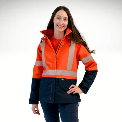 MWG STORMSHIELD™ Women's FR Rain Jacket. Women's FR Rain Jacket is bright orange and navy with silver reflective on torso and sleeves. Inherent flame-resistant fabric.