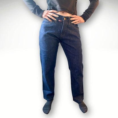 Women's FR Stretch Denim Jean. Women's FR Jeans are navy with gold stitching.