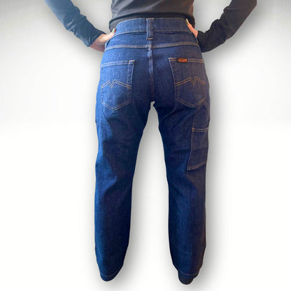 Women's FR Stretch Denim Jean. Women's FR Jeans are navy with gold stitching.