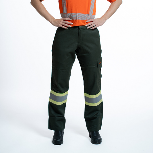MWG COMFORT WEAVE Women's FR Utility Pants. Women's FR Pants are green in color with silver reflective striping on lower legs for high-visibility. Women's FR Pants are made with inherently fire resistant fabric. Women's FR Pants are CAT 2 FR.