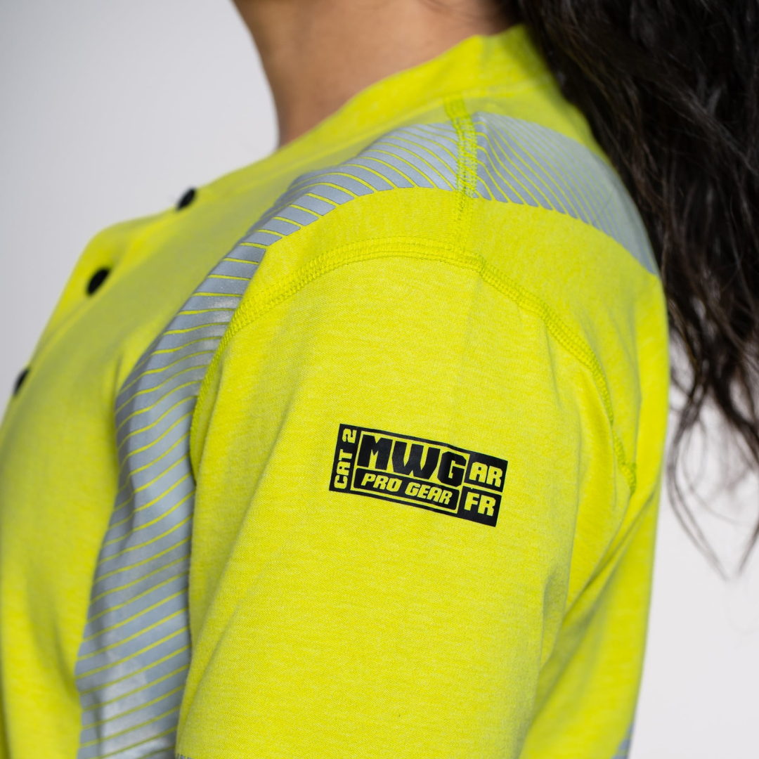 MWG EVOLUTION Women's FR Henley. Women's FR Shirt is bright yellow with reflective striping. Women's FR Shirt is CAT 2 FR.